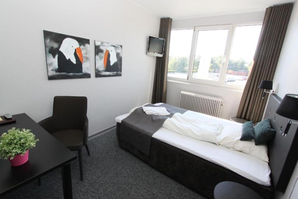 Banegaardshotellet Vojens Екстериор снимка
