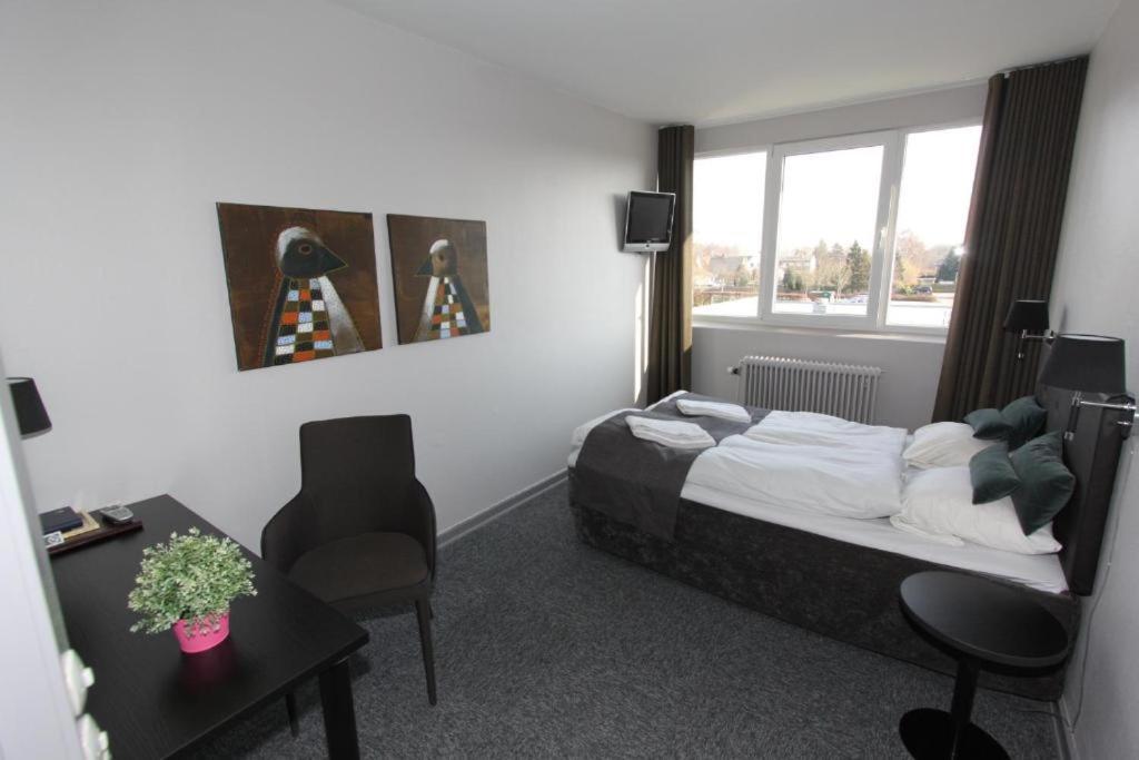Banegaardshotellet Vojens Екстериор снимка